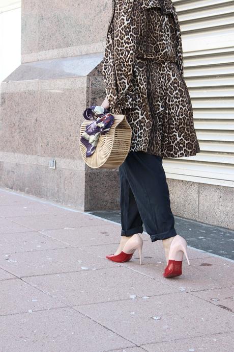 how to stay on trend without breaking your bank, h&M wide leg pants. aldo colorblock heels, spring fashion, animal print trench , half bun, blogger , cult gaia bamboo bag, street fashion, 1