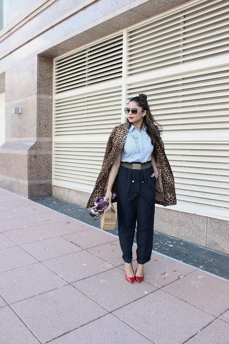 how to stay on trend without breaking your bank, h&M wide leg pants. aldo colorblock heels, spring fashion, animal print trench , half bun, blogger , cult gaia bamboo bag, street fashion, 1