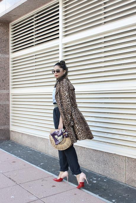 how to stay on trend without breaking your bank, h&M wide leg pants. aldo colorblock heels, spring fashion, animal print trench , half bun, blogger , cult gaia bamboo bag, street fashion, 1