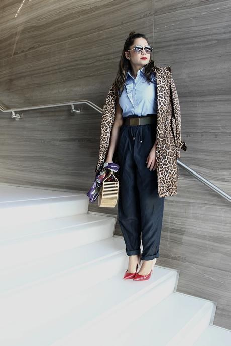 how to stay on trend without breaking your bank, h&M wide leg pants. aldo colorblock heels, spring fashion, animal print trench , half bun, blogger , cult gaia bamboo bag, street fashion, 1