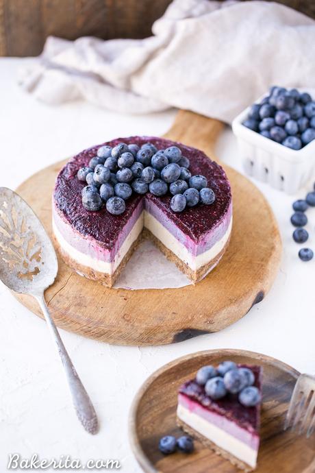 This No-Bake Layered Blueberry Cheesecake is a beautiful and easy-to-make Paleo-friendly + vegan cheesecake made with soaked cashews! The cheesecake layers are lusciously smooth and creamy with a tart, fruity topping.