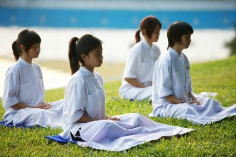 Children meditating - a unique alternative thing to do in Bangkok