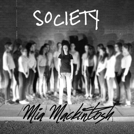 Image may contain: 1 person, text and outdoor