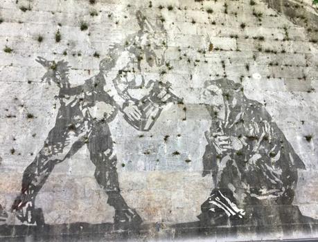 wall art along the Tiber River in Rome