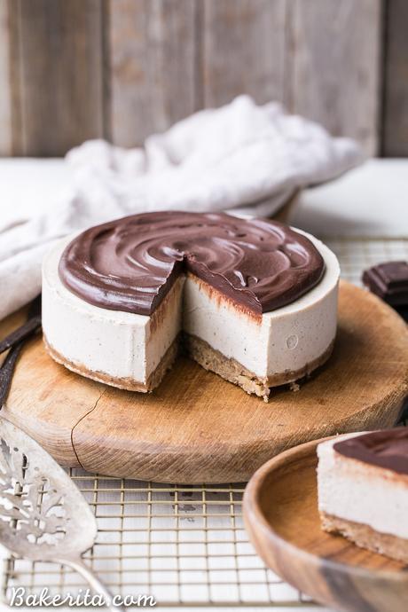 This No-Bake Vanilla Bean Cheesecake with Chocolate Ganache is a gluten-free, Paleo and vegan cheesecake made with a walnut crust, a creamy cashew cheesecake filling, topped with a luscious chocolate ganache. This healthier cheesecake alternative will satisfy your cheesecake cravings!