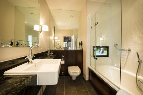 Watch TV in the bath in a luxury London hotel