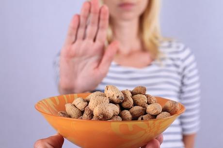 woman rejecting peanuts