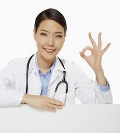 Cheerful medical personnel showing hand gesture