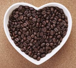 coffee beans in heart shaped bowl