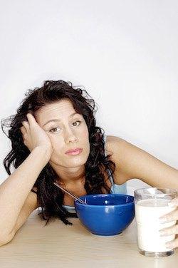 woman with glass of milk