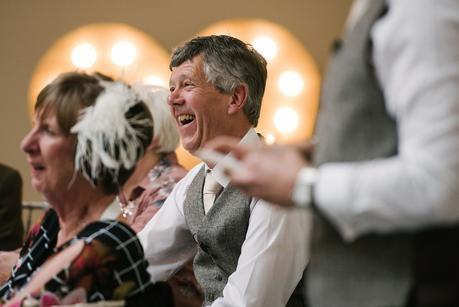 father of the bride laughing 