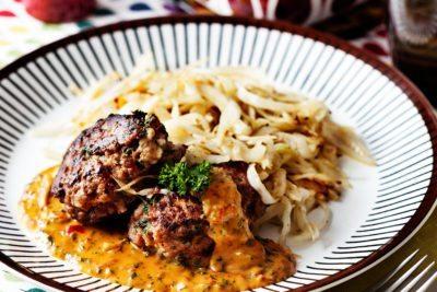 Hamburger Patties with Creamy Tomato Sauce and Fried Cabbage