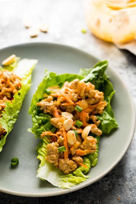 Thai turkey meal prep lettuce wraps make for an easy, low carb meal prep dinner or lunch. Prep the Thai peanut turkey filling ahead and serve on crunchy romaine lettuce leaves.