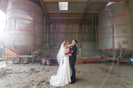 Bride & groom in the barn at The Normans wedding venue in York