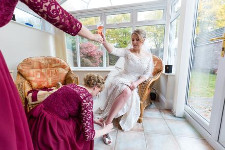 Bride handed a glass of champagne at York Wedding
