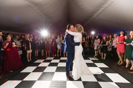 Bride & Grooms first dance on chequered dance floor at The Normans