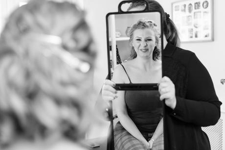 Reflection of bride in the mirror at York wedding