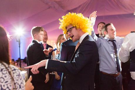 Silly guest wears yellow wig at York wedding