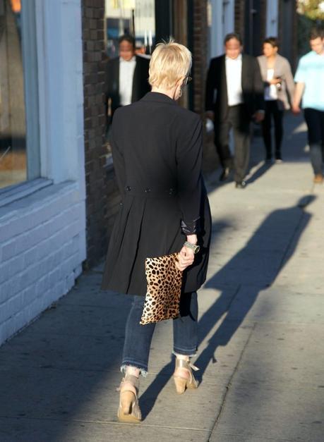 long navy jacket and leopard print bag