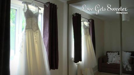 bespoke wedding dress hanging up at brides house in Ewloe