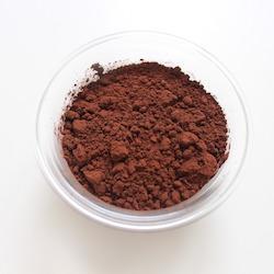 cocoa powder in glass bowl