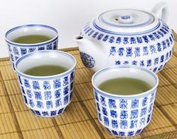 green tea in traditional chinese cups