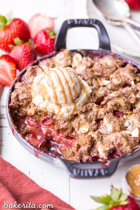 This Strawberry Crisp with Almond Butter Crumble is an irresistible pairing of fresh strawberries and a lightly-sweetened, rich and crispy almond butter cookie crumble. You won't be able to resist this gluten-free, paleo, and vegan dessert.