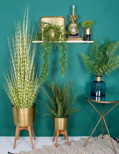 We’ve gone for the full wall styling here, to show how a few faux plants and a white marble shelf can make a vibrant and exciting vignette of green and gold in your home. So lots of gold for a really luxe look but softened with stacks of faux plants that are a dream for the non-green fingered amongst us. It couldn’t be easier!