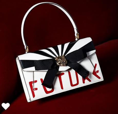 Gucci Handbag in blak, white and red. 