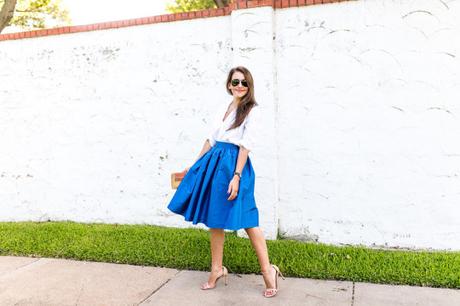 Amy Havins wears a blue lady length party skirt.