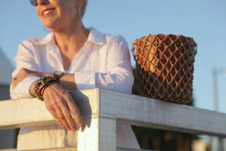 details: Hermes leather wrap bracelet and French Kande bracelet worn by style bloger Susan B. of une femme d'un certain age