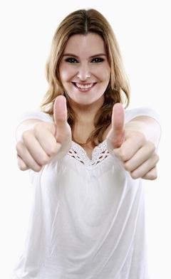 Woman showing double thumbs up