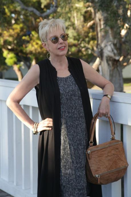 style blogger Susan B. wearing Eileen Fisher dresses, a French Kande bracelet and Givenchy Pandora bag.