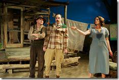 from right, Josie Hogan (Carolyn Klein) whips T. Stedman Harder (Stuart Ritter) into shape with a little help from Dad (Brad Armacost) in Seanachaí Theatre Company’s production of A MOON FOR THE MISBEGOTTEN by Eugene O’Neill, directed by Kevin Theis at The Irish American Heritage Center. 