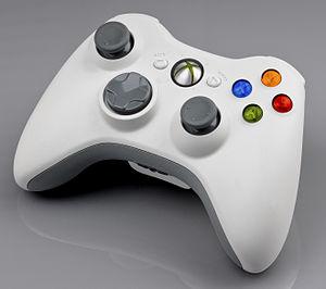 The Xbox 360 wireless controller in white.