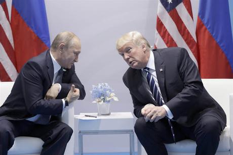 Trump Knuckles Under To Putin In Their First Meeting