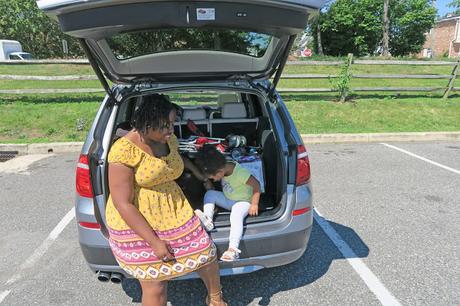 mother and daughter in back of bmw