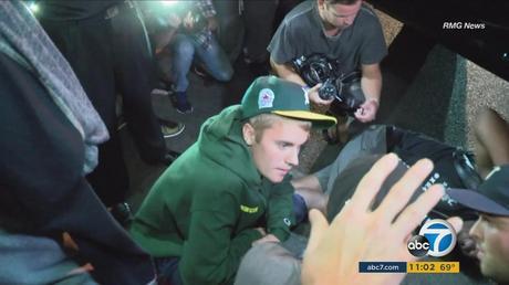 JUSTIN BIEBER ACCIDENTALLY DRIVES OVER  PAPARAZZI AFTER LEAVING CHURCH SERVICE
