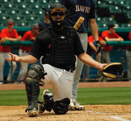 Tip for catchers to help their coach on close pitches