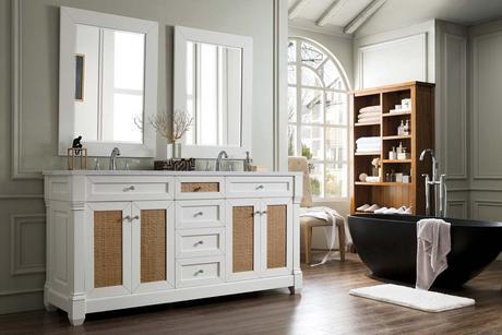 White bathroom vanities with natural elements like raffia doors look great