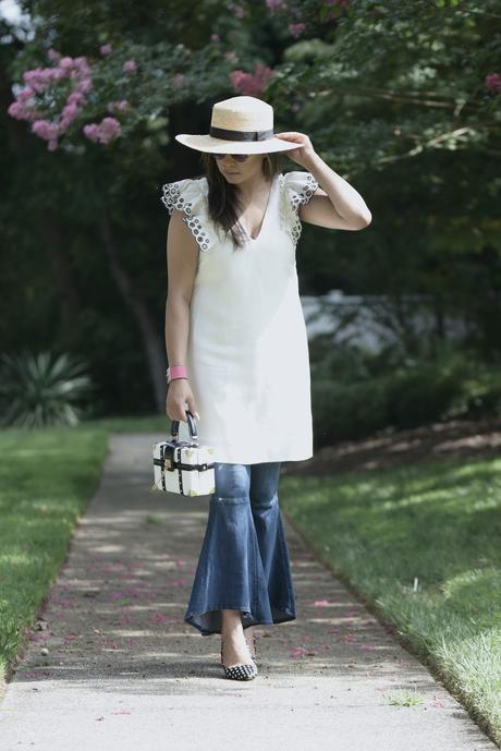 how to wear ruffled jeans, dress over jeans, street style outfit, fashion , j crew ruffle sleeve dress, free people jeans , ruffle hem, starw hat, myriad musings