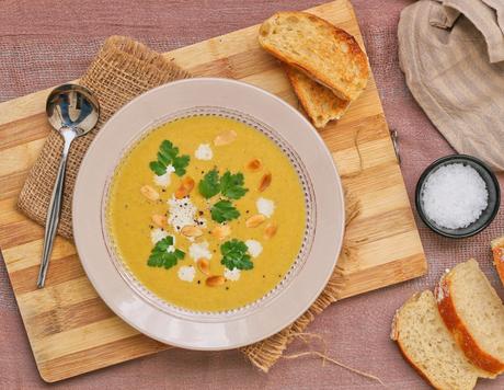 Aerial shot of butternut soup with cream. 