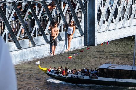 getting ready to jump off the Luís I Bridge into the Douro River, Porto