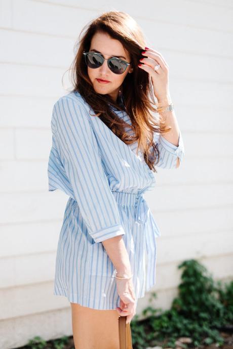 Amy Havins wears a blue and white romper.