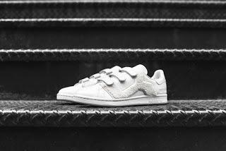 Raf Rolls On: Adidas Originals X Raf Simons Stan Smith Badge Sneakers Raf Rolls On: Adidas Originals X Raf Simons Stan Smith Badge Sneakers