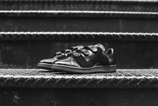 Raf Rolls On: Adidas Originals X Raf Simons Stan Smith Badge Sneakers Raf Rolls On: Adidas Originals X Raf Simons Stan Smith Badge Sneakers