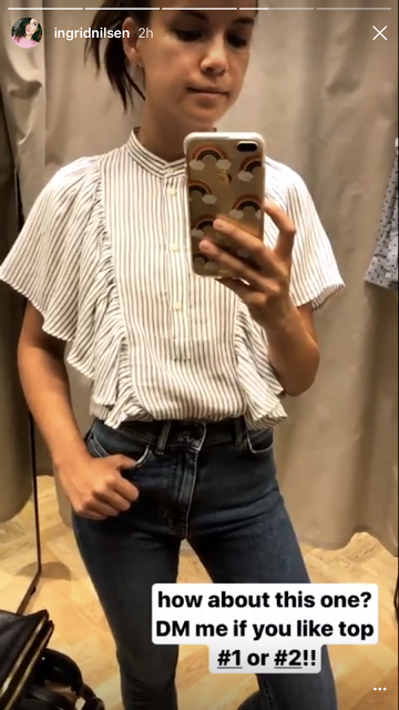 Ingrid Nilsen shopping for a ruffle top wants to know our choice.
