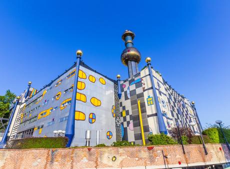 80. The Spittelau District Heating Plant in Vienna is beamed directly from the wacky mind of esteemed artist and architect Hundertwasser.