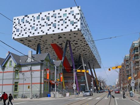 85. Walk under the colourful table-top structure of the Ontario College of Art and Design in Canada.