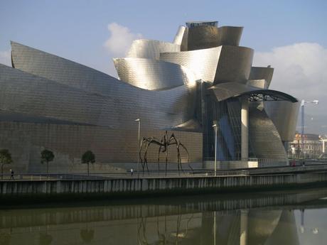 65. Made out of glass, limestone, and titanium, Frank Gehry's Guggenheim Bilbao in Spain shimmers in the sunlight.